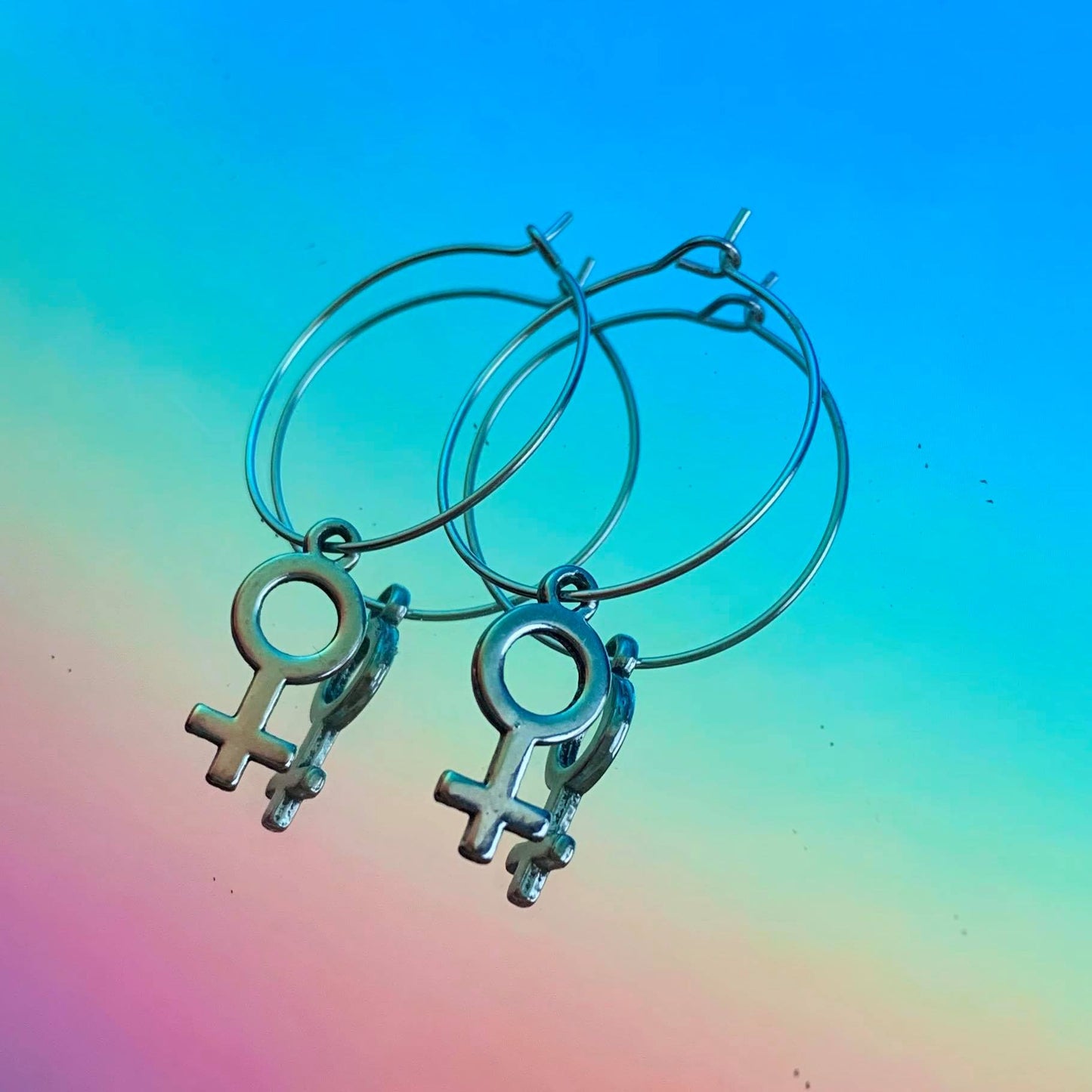 FEMALE SIGN EARRINGS