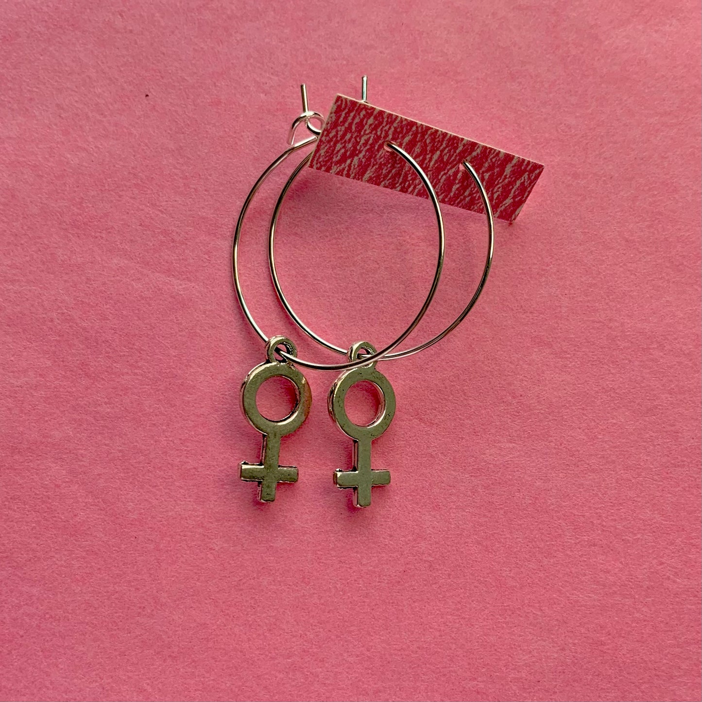 FEMALE SIGN EARRINGS